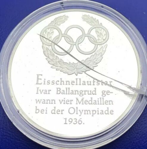 Médaille argent, Histoire des Jeux Olympiques, Garmisch 1936